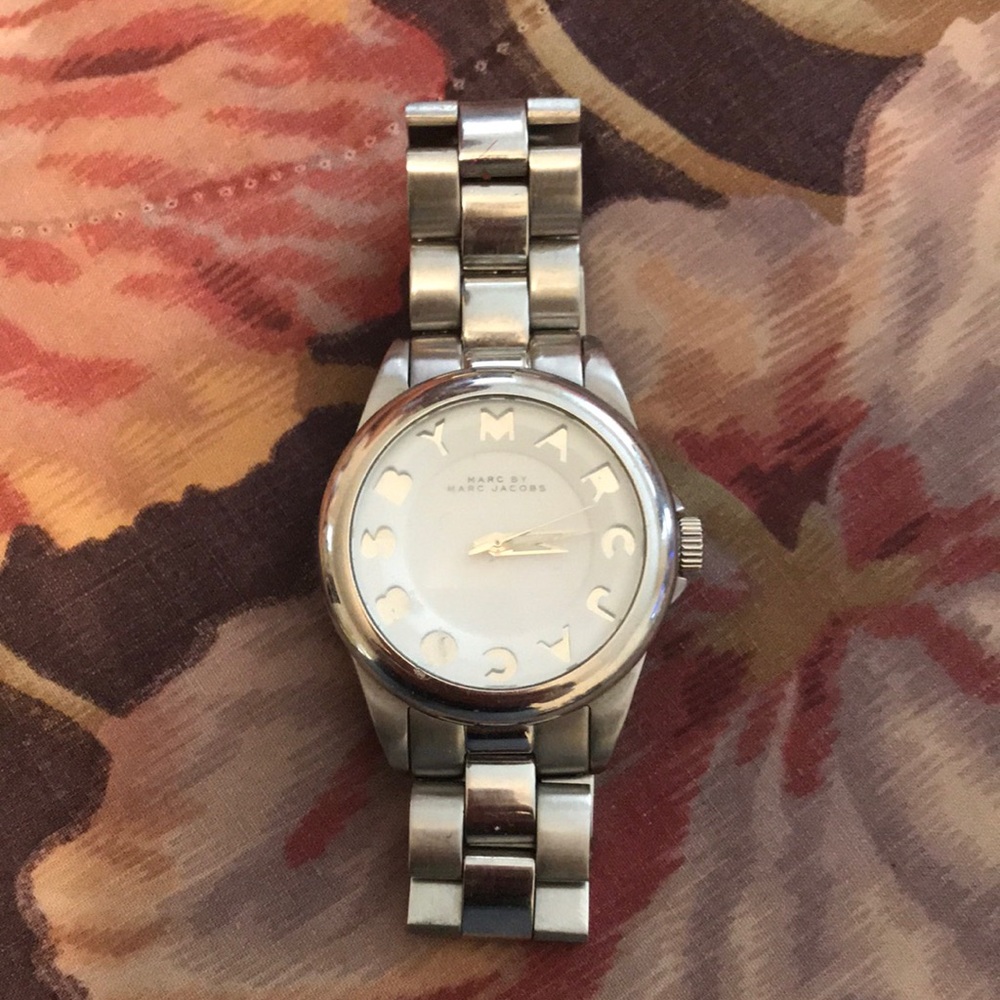 Silver Marc Jacobs watch with white face